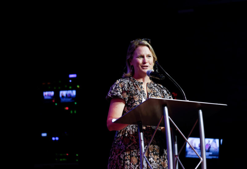 Nicole Heimarck of Reaching Higher NH speaks at the Foundation's "Here for Good" event at the Capitol Center for the Arts in Concord on Tuesday, September 17, 2024. (Photo by Cheryl Senter).